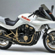 Image for article titled Suzuki Made A Rad Futuristic Motorcycle With A Pop-Up Headlight